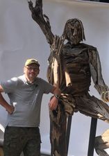 Dean Greeno with his driftwood sculpture