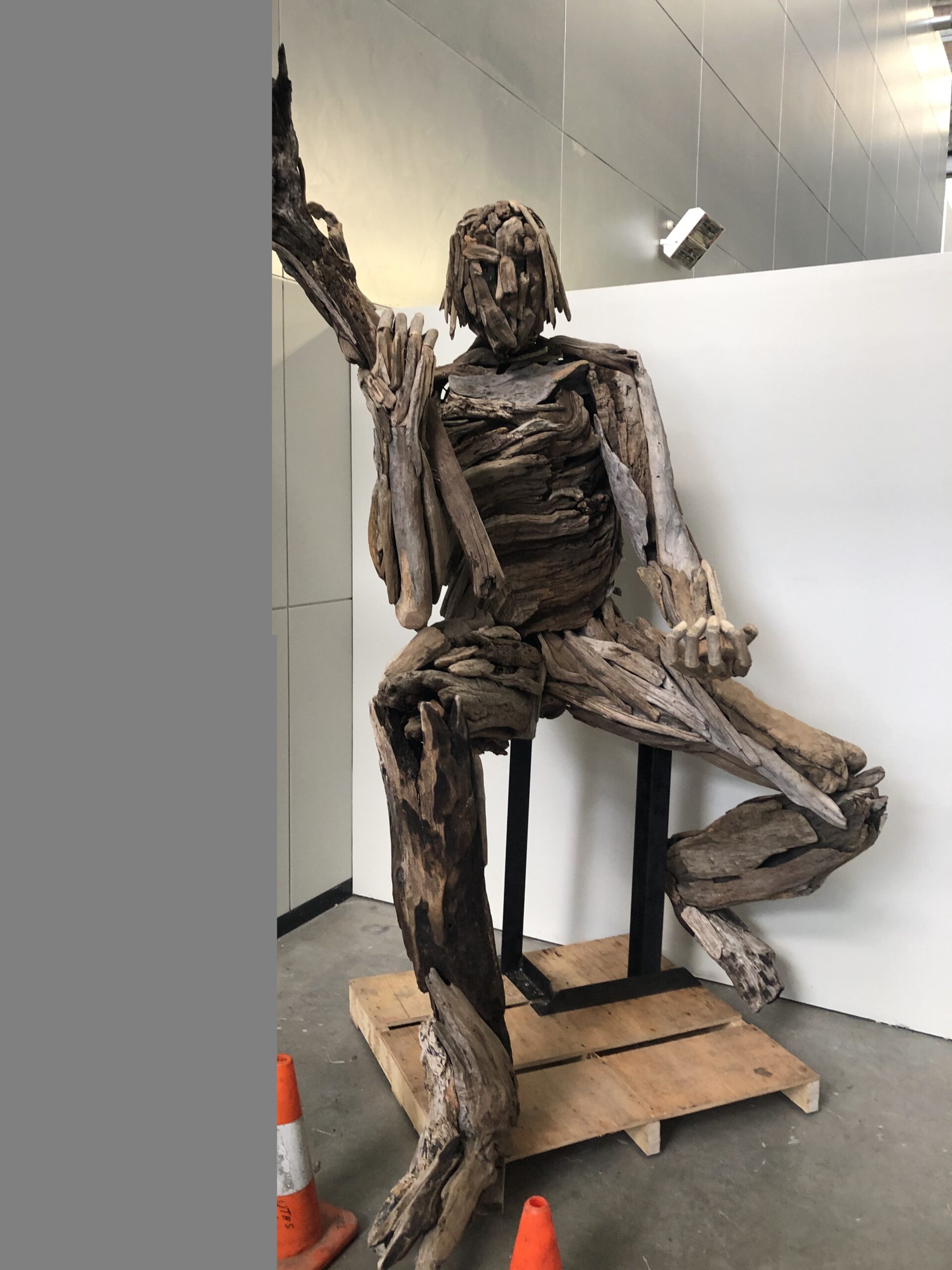 Image of Sitting Man Driftwood sculpture by Dean Greeno in his Artist Profile Story with Art Trails Tasmania