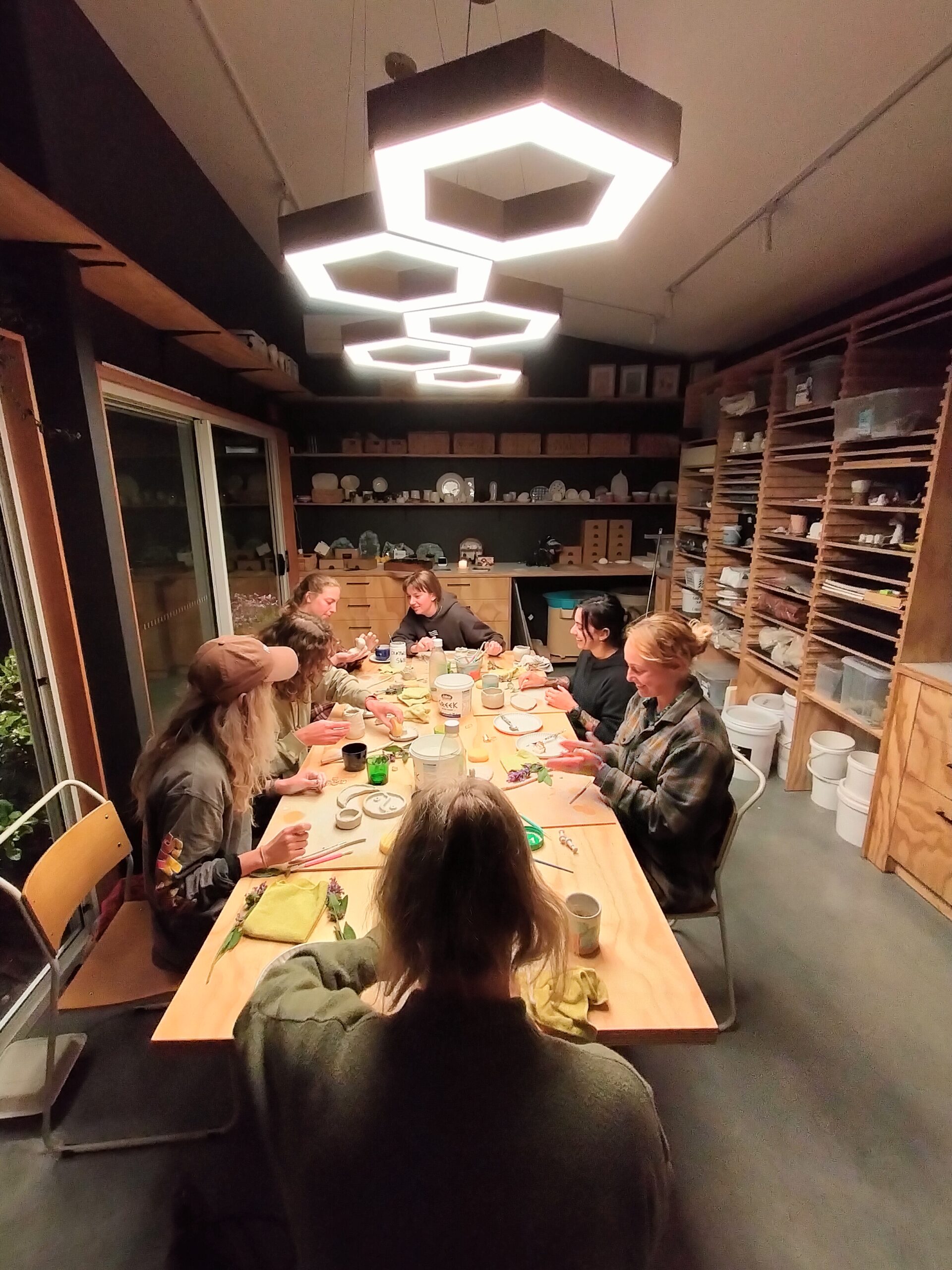 Image shows a workshop of students in the studio of by Christie Lange in her Artist Profile Art Trails Tasmania