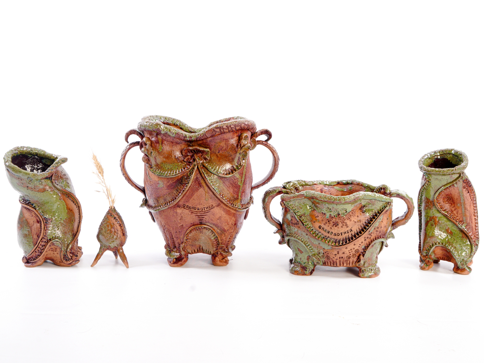 Image shows a series of ceramic vases in tribute to her grandmother by the artist Lee-Anne Peters for her Exhibition News Lee-Anne Peters Solo Exhibition Initiation Into the Unknown Art Trails Tasmania
