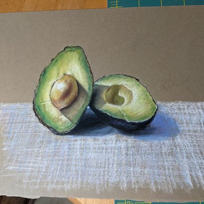 The image shows a pastel rendered image of an avocado cut in half by Dianne Horvath Art Trails Tasmania