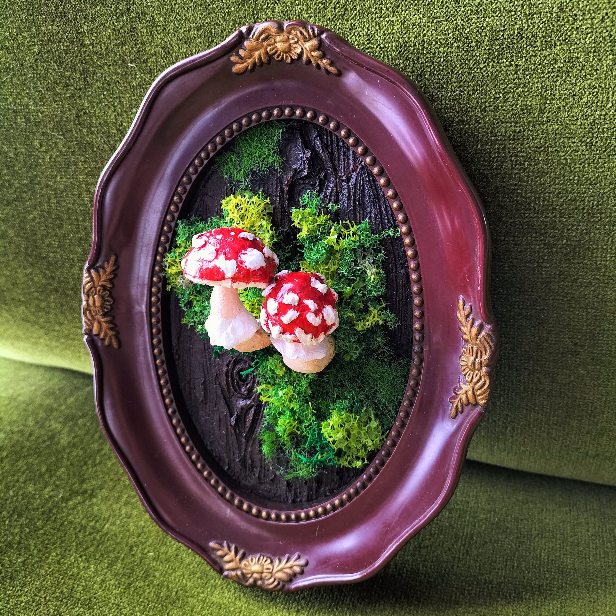 Image shows a framed image of mushrooms for the Artist Profile Crafting Magical Worlds and Nature's Wonders with Laurinda Brooker Art Trails Tasmania