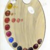 This image shows a vintage illustration of an artist's kidney palette with 19 colours in oil paint and is for the Art Trails Tasmania digital print shop