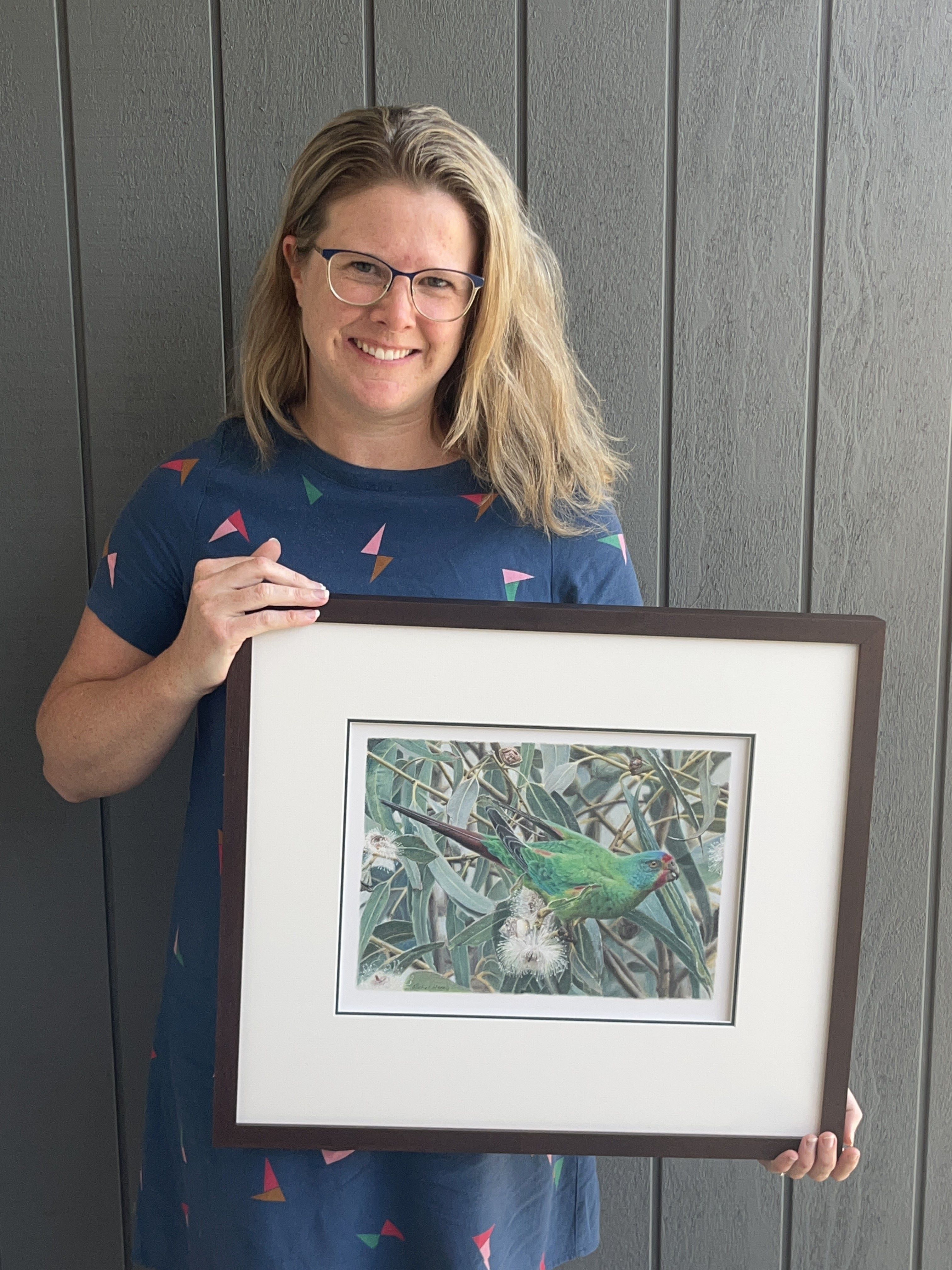 swift-parrot-drawing-Rachel-Harris-Art Artist Profile story with Art Trails Tasmania Explore your creativity Image shows a verdant landscape with rolling green hills, blue sky with passing clouds for the Artist Profile Sharing Stories and Connections Through Bold Colours and Mark-Making with Julie McDonald Art Trails Tasmania