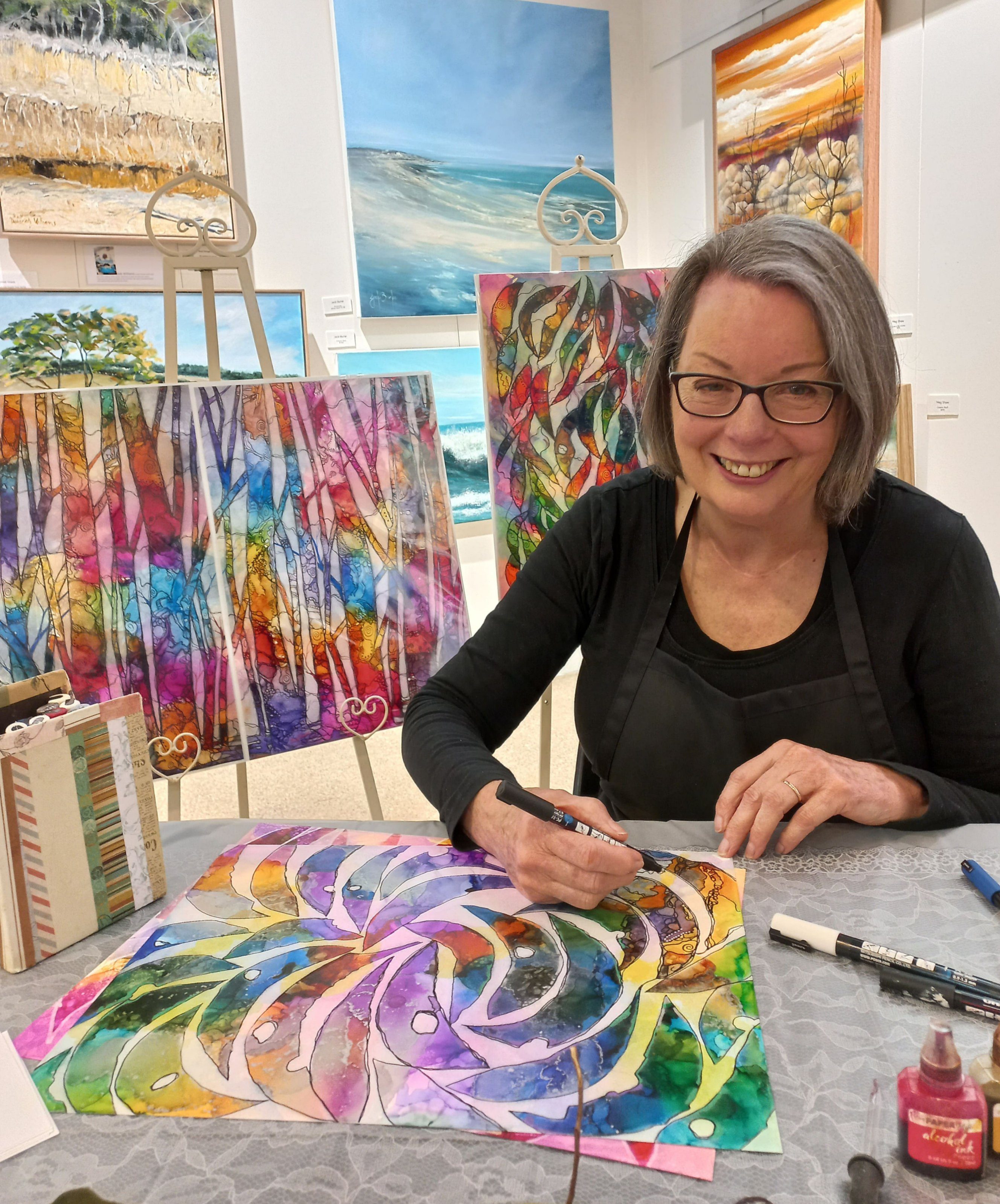 Image shows a watercolour landscape for the Artist Profile Sharing Stories and Connections Through Bold Colours and Mark-Making with Julie McDonald Art Trails Tasmania