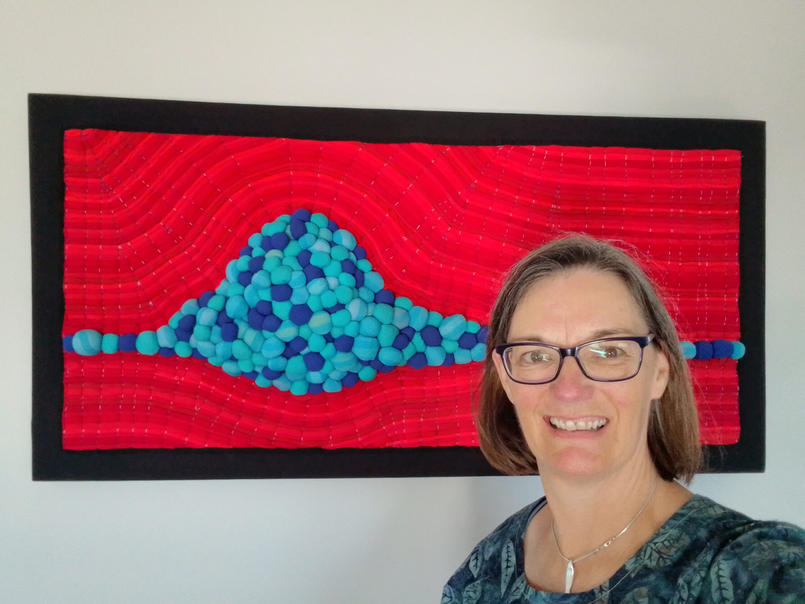 Image shows Julie McDonald for her Artist Profile Sharing Stories and Connections Through Bold Colours and Mark-Making with Julie McDonald Art Trails Tasmania