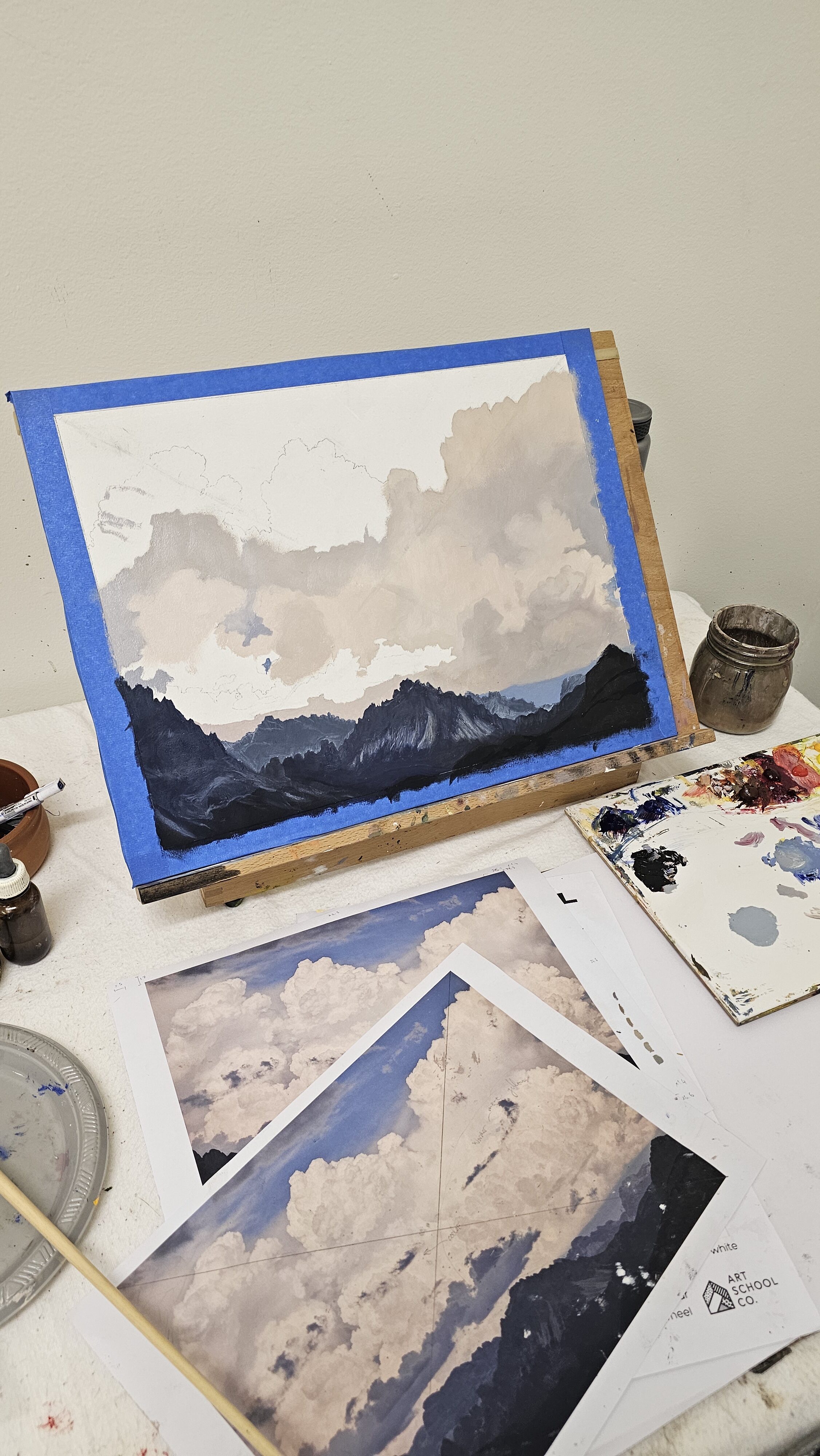 Image shows a studio view with pink roses set up for painting for the Artist Profile Sharing Stories and Connections Through Bold Colours and Mark-Making with Julie McDonald Art Trails Tasmania
